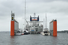 Semi-submersible ship loads yachts bound for NY