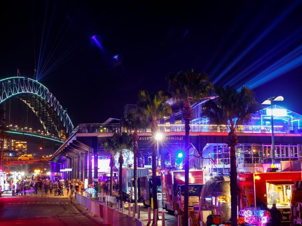 Food trucks at Overseas Passenger Terminal during Vivid Sydney with lights in the background