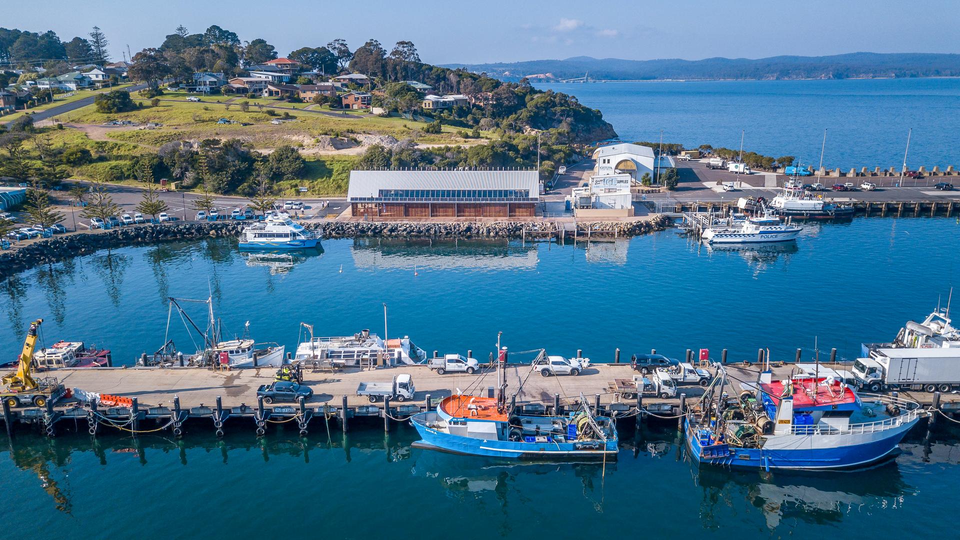Aerial view of Eden Welcome Centre and vessels on the water
