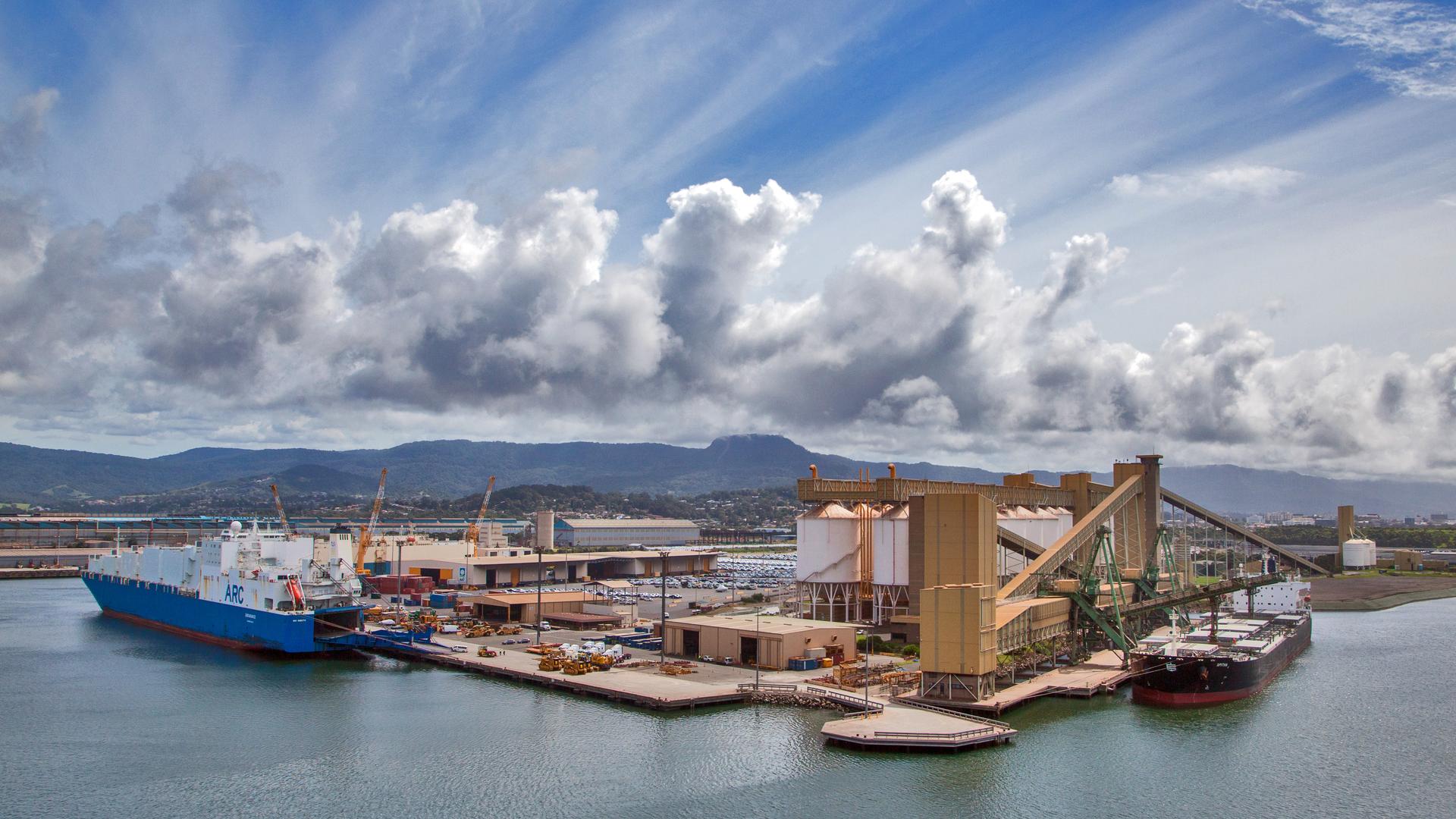 Aerial of Port Kembla port showing siloes and two ships docked