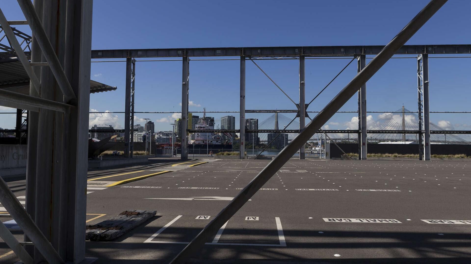 Looking across empty car park towards the Anzac Bridge and Pyrmont