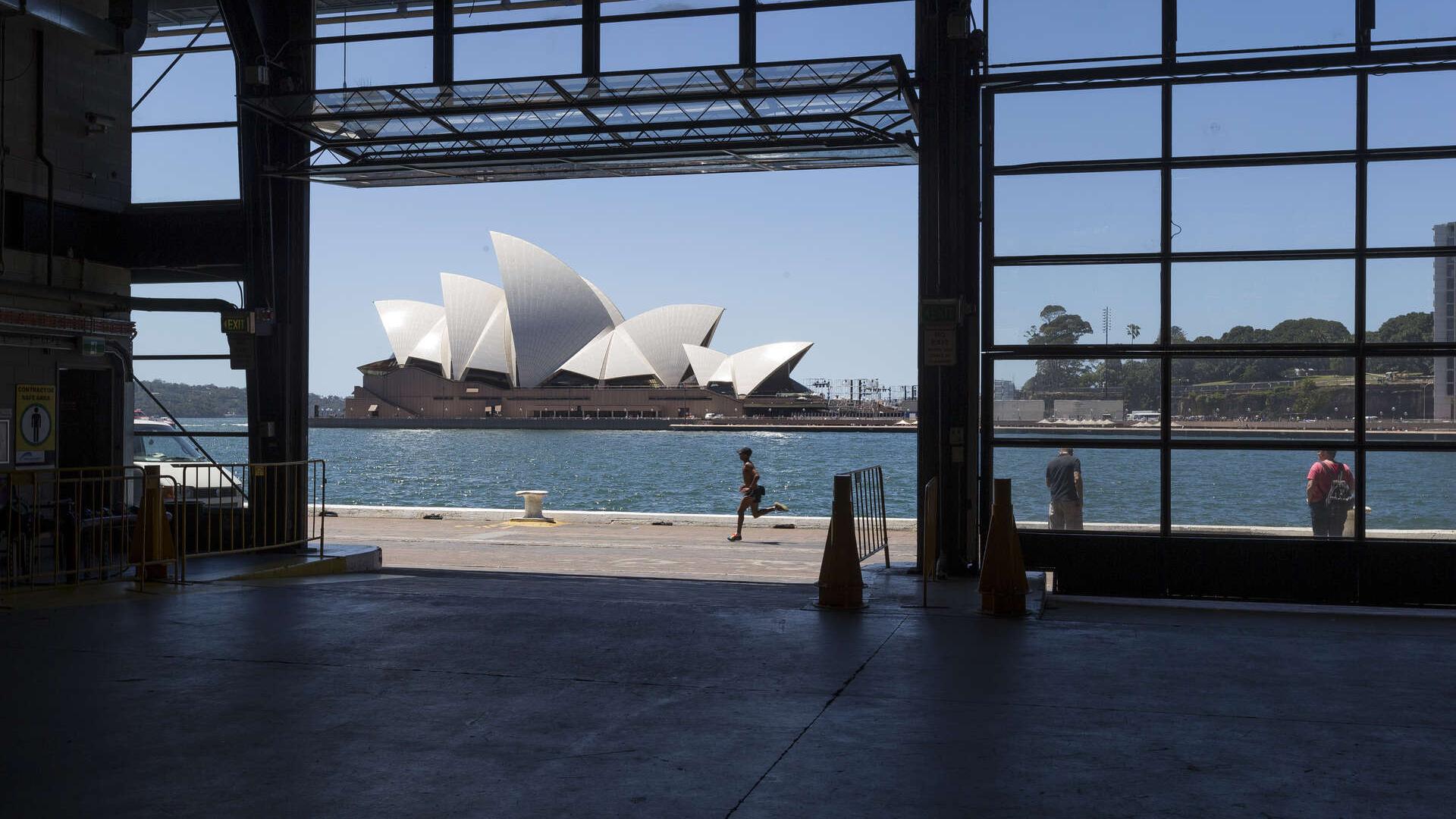 Inside the Cargo Hall frames the picture looking out at the Opera House
