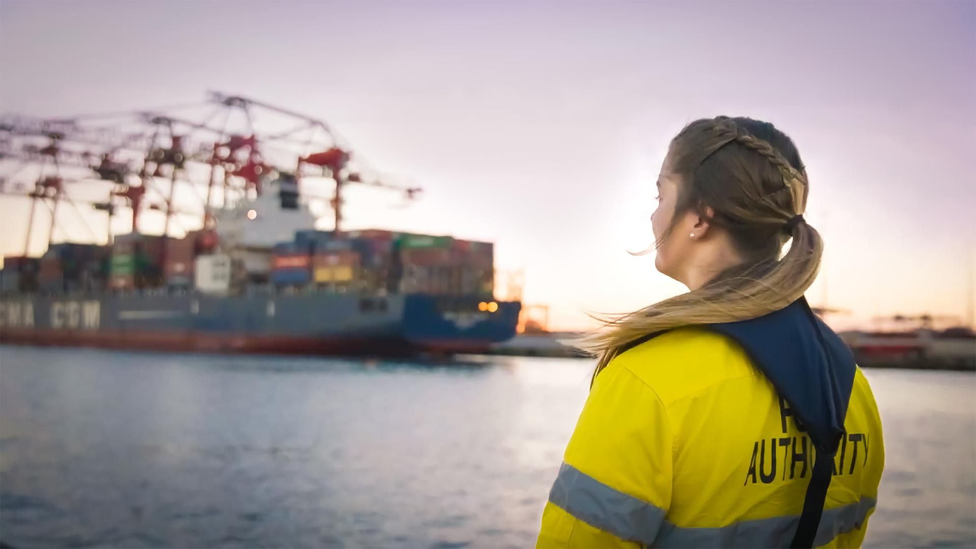 A worker at Port Authority of New South Wales looking at a ship